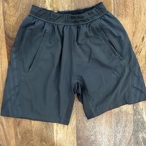 Adidas men’s size small shorts, inseam 7 inches. Signs of wear on left leg